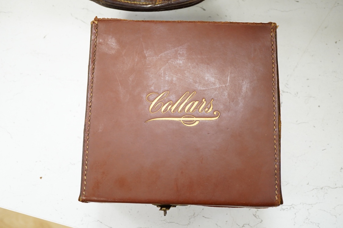 Two late 19th century brown leather magazine cases and another ‘collars’ box, largest 41cm wide